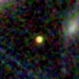Colour composite: F444W red, F356W green, F277W blue, 3.2 arcsec across, north up
