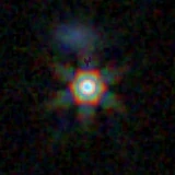 Colour composite: F444W red, F356W green, F277W blue, 3.2 arcsec across, north up