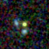 Colour composite: F444W red, F356W green, F277W blue, 3.2 arcsec across, north up