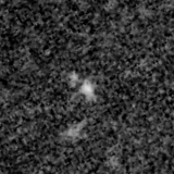 F115W image, 3.2 arcsec across, north up