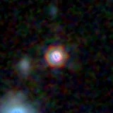 Colour composite: F444W red, F356W green, F277W blue, 3.2 arcsec across, north up