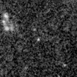 F115W image, 3.2 arcsec across, north up