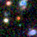 Colour composite: F444W red, F356W green, F277W blue, 3.2 arcsec across, north up