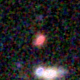 Colour composite: F444W red, F356W green, F277W blue, 3.2 arcsec across, north up