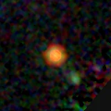 Colour composite: F444W red, F356W green, F277W blue, 3.2 arcsec across, north up