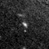 F115W image, 3.2 arcsec across, north up