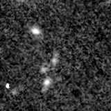 F115W image, 3.2 arcsec across, north up