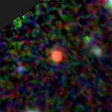 Colour composite: F444W red, F356W green, F277W blue, 3.2 arcsec across, north up