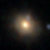 Colour composite: F444W red, F356W green, F277W blue, 3.2 arcsec across, north up