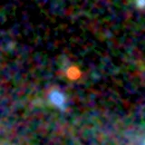 Colour composite: F444W red, F356W green, F277W blue, 3.2 arcsec across, north up