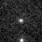 F115W image, 3.2 arcsec across, north up
