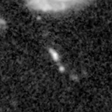 F115W image, 3.2 arcsec across, north up