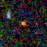 Colour composite: F444W red, F356W green, F277W blue, 3.2 arcsec across, north up