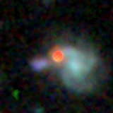 Colour composite: F444W red, F356W green, F277W blue, 3.2 arcsec across, north up