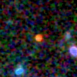 Colour composite: F444W red, F356W green, F277W blue, 3.2 arcsec across, north up