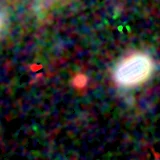 Colour composite: F444W red, F356W green, F277W blue, 3.2 arcsec across, north up