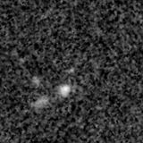 F115W image, 3.2 arcsec across, north up