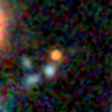 Colour composite: F444W red, F356W green, F277W blue, 3.2 arcsec across, north up