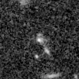 F200W image, 3.2 arcsec across, north up