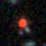 Colour composite: F444W red, F356W green, F277W blue, 3.2 arcsec across, north up