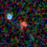 Colour composite: F444W red, F356W green, F277W blue, 3.2 arcsec across, north up