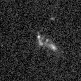 F115W image, 3.2 arcsec across, north up