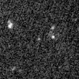 F115W image, 3.2 arcsec across, north up