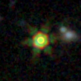 Colour composite: F444W red, F356W green, F277W blue, 3.2 arcsec across, north up