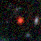Colour composite: F444W red, F356W green, F277W blue, 3.2 arcsec across, north up