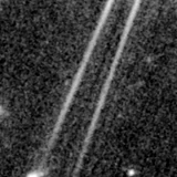 F115W image, 3.2 arcsec across, north up