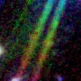 Colour composite: F444W red, F356W green, F277W blue, 3.2 arcsec across, north up