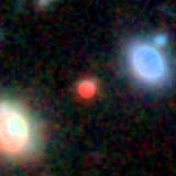 Colour composite: F444W red, F356W green, F277W blue, 3.2 arcsec across, north up