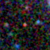 Colour composite: F444W red, F356W green, F277W blue, 3.2 arcsec across, north up