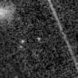 F115W image, 3.2 arcsec across, north up