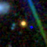 Colour composite: F444W red, F356W green, F277W blue, 3.2 arcsec across, north up