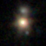 Colour composite: F444W red, F356W green, F277W blue, 3.2 arcsec across, north up