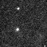 F115W image, 3.2 arcsec across, north up