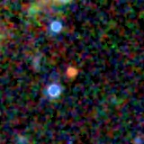 Colour composite: F444W red, F356W green, F277W blue, 3.2 arcsec across, north up