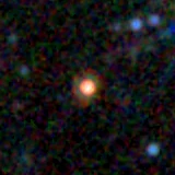 Colour composite: F444W red, F356W green, F277W blue, 3.2 arcsec across, north up