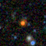 Colour composite: F444W red, F356W green, F277W blue, 3.2 arcsec across, north up