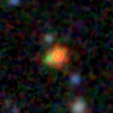 Colour composite: F444W red, F356W green, F277W blue, 3.2 arcsec across, north up