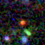 Colour composite: F444W red, F356W green, F277W blue, 3.2 arcsec across, north up