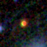 Colour composite: F444W red, F356W green, F277W blue, 3.2 arcsec across, north up
