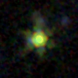 Colour composite: F444W red, F356W green, F277W blue, 3.2 arcsec across, north up