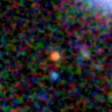 Colour composite: F444W red, F356W green, F277W blue, 3.2 arcsec across, north up