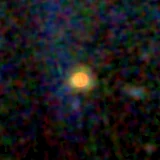 Colour composite: F444W red, F356W green, F277W blue, 3.2 arcsec across, north up
