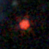 Colour composite: F444W red, F356W green, F277W blue, 3.2 arcsec across, north up