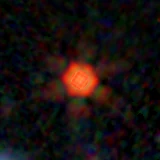 Colour composite: F444W red, F356W green, F277W blue, 3.2 arcsec across, north up