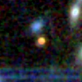 Colour composite: F444W red, F356W green, F277W blue, 3.2 arcsec across, north up