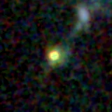 Colour composite: F444W red, F356W green, F277W blue, 3.2 arcsec across, north up